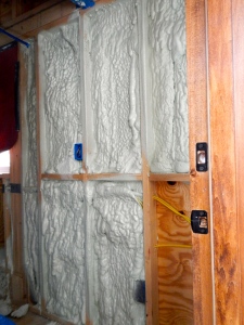 Showing the insulation as it is put in place. Two inches of 3 lb closed cell foam.